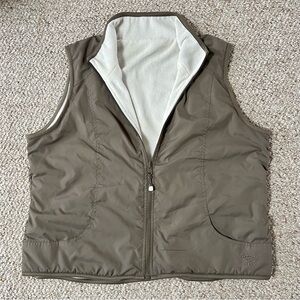 OCS Khaki outerwear vest with fleece lining, featuring pockets and a full zipper